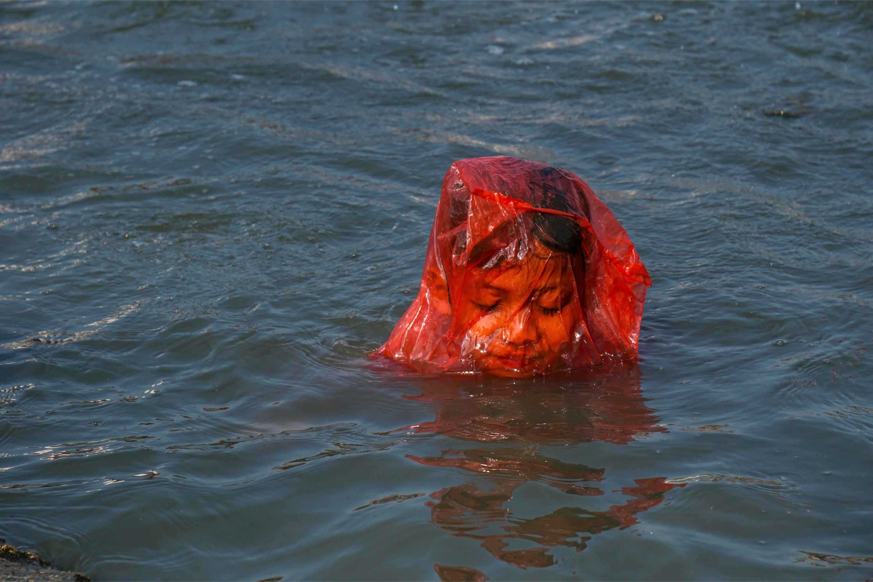 The Sea as Playground: How Jakarta's Poor Children Cool Their Bodies